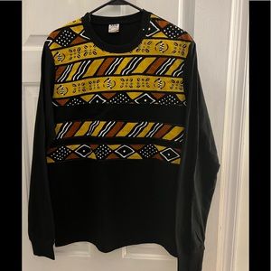 T-Shirt accented with Afrocentric fabric